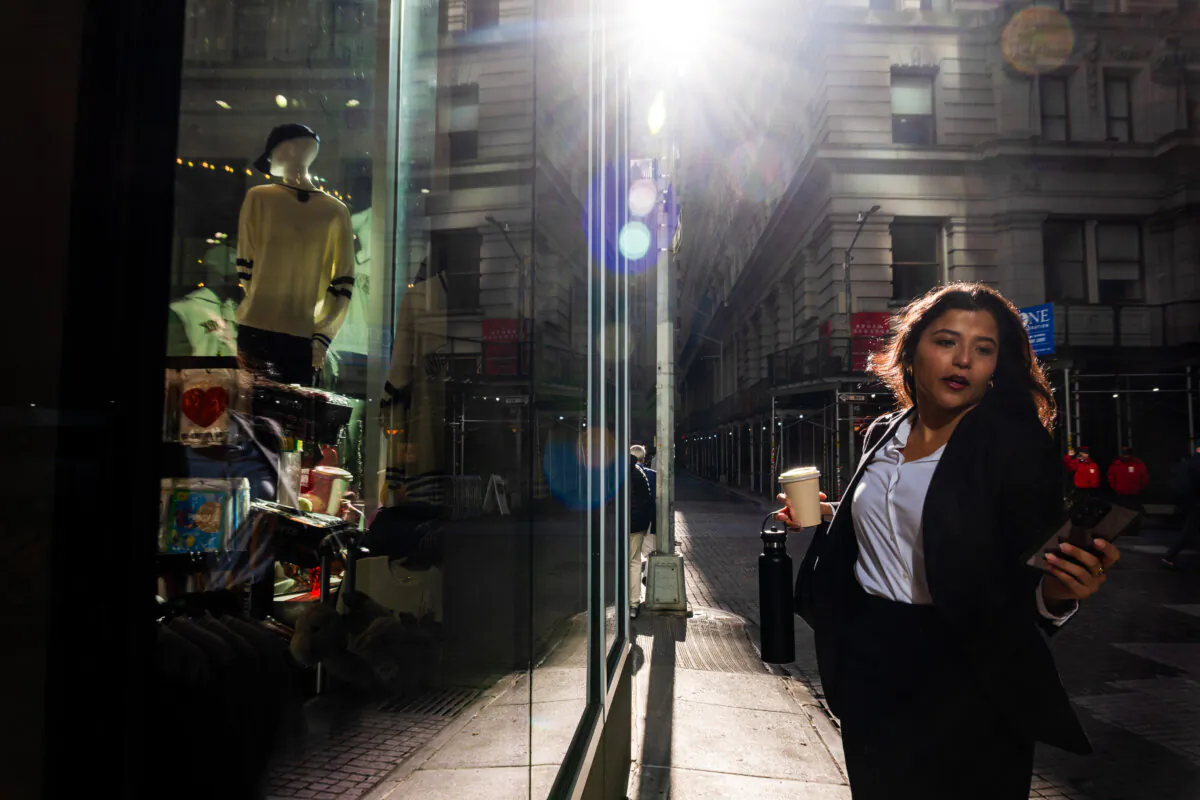 People walk through the Financial District near the New York Stock Exchange in New York City, on March 19, 2025. (Spencer Platt/Getty Images)