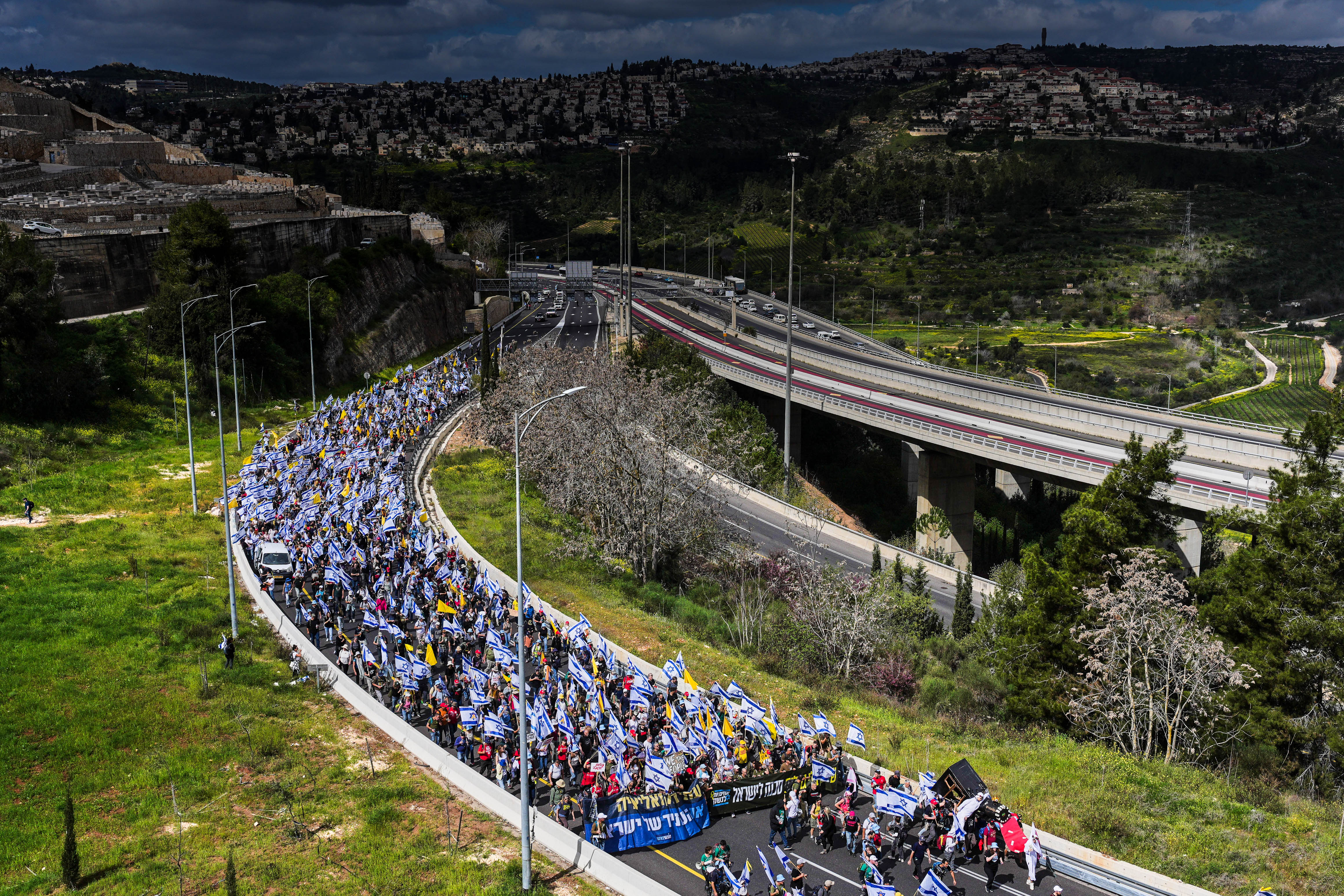 Day in Photos: Protests in Israel, New First Class Service From Lufthansa, and Cherry Blossoms in Washington