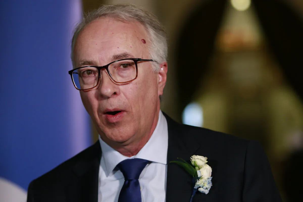 B.C. Conservative Leader John Rustad speaks to reporters following the throne speech at the legislature in Victoria, Feb. 18, 2025. (The Canadian Press/Chad Hipolito)