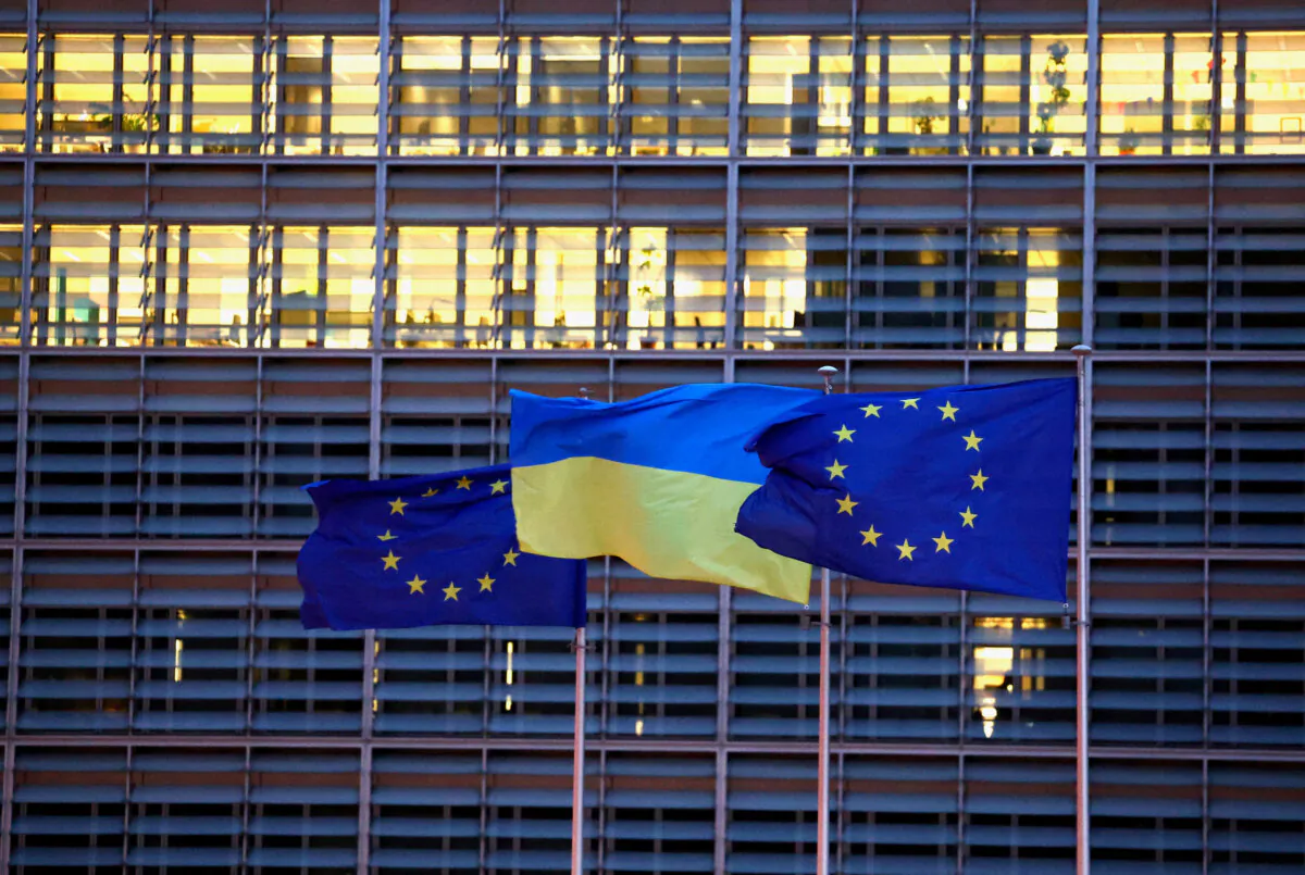 European Union flags and a Ukrainian flag outside the EU Commission headquarters in Brussels on Feb. 24, 2025. (Yves Herman /Reuters)