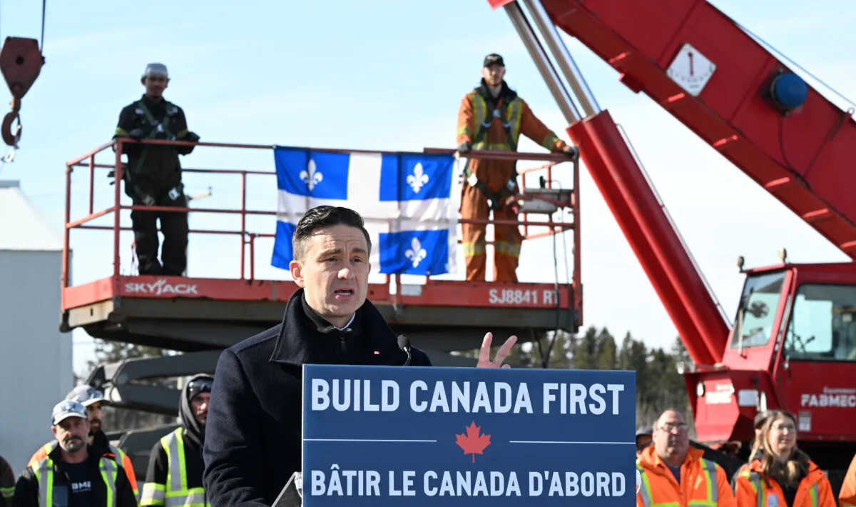 Conservative Leader Pierre Poilievre speaks at a news conference in Saguenay, Que., on March 20, 2025. (Jacques Boissinot/The Canadian Press)