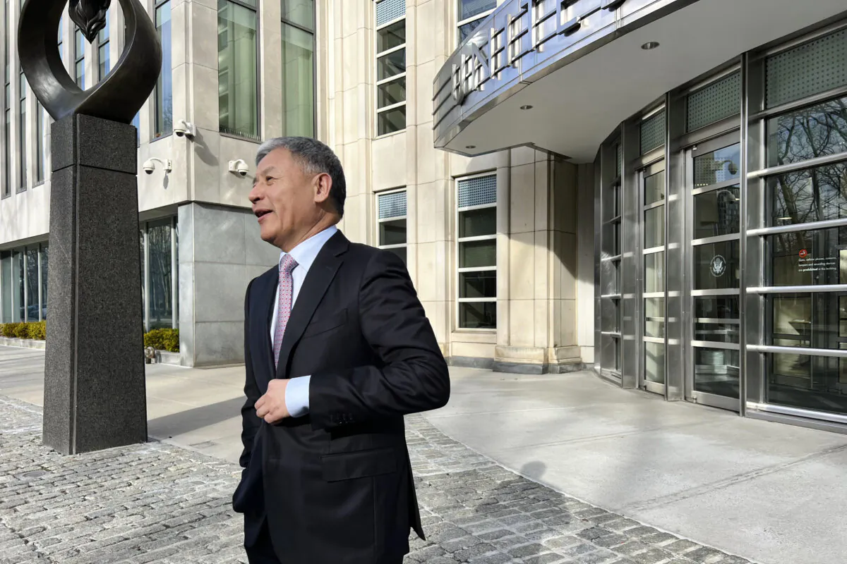 An Quanzhong stands outside of the federal courthouse in New York City on March 19, 2025. (Cai Rong/The Epoch Times)