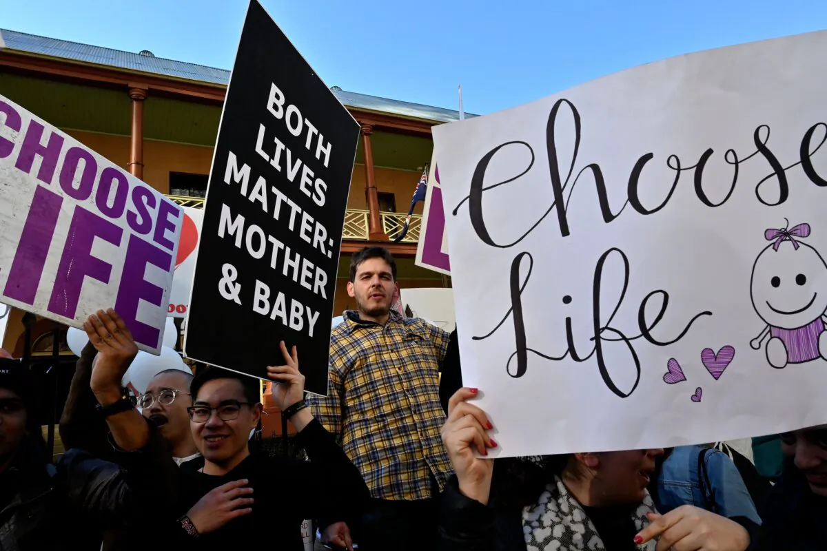 Pro-life and pro-choice advocates hold a protest rally outside the New South Wales Parliament in Sydney, Australia on Aug. 6, 2019. (Saeed Khan/AFP via Getty Images)