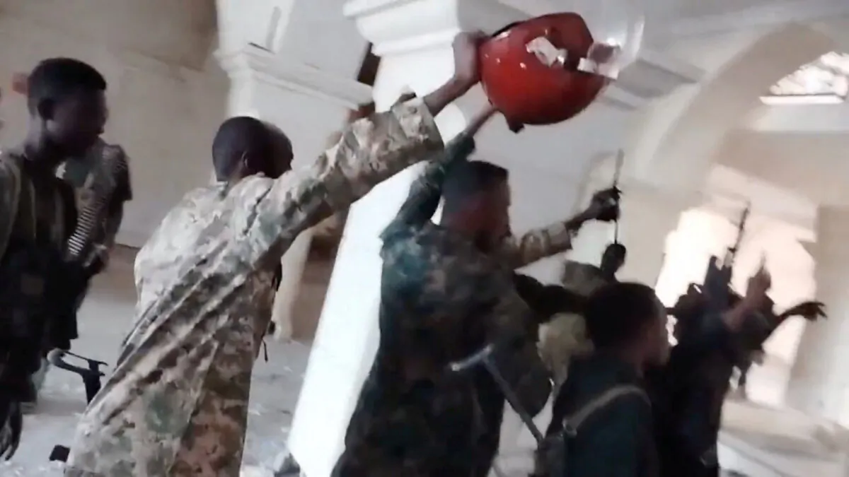 Screen grab of a video of Sudanese army soldiers celebrating inside the presidential palace in Khartoum, Sudan, on March 21, 2025. (Social Media via Reuters)