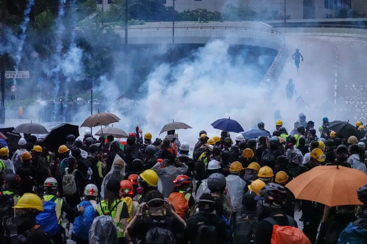 The police fired tear gas to disperse protesters in Wan Chai, Hong Kong, on Aug. 31, 2019. (Adrian Yu/The Epoch Times)