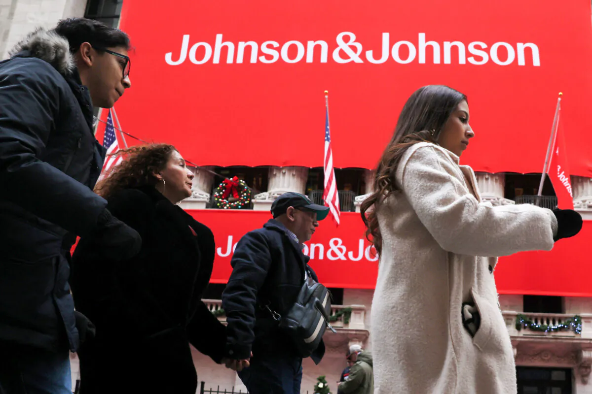 A Johnson & Johnson banner is displayed on the front of the New York Stock Exchange (NYSE) in New York City, on Dec. 5, 2023. (Brendan McDermid/Reuters)