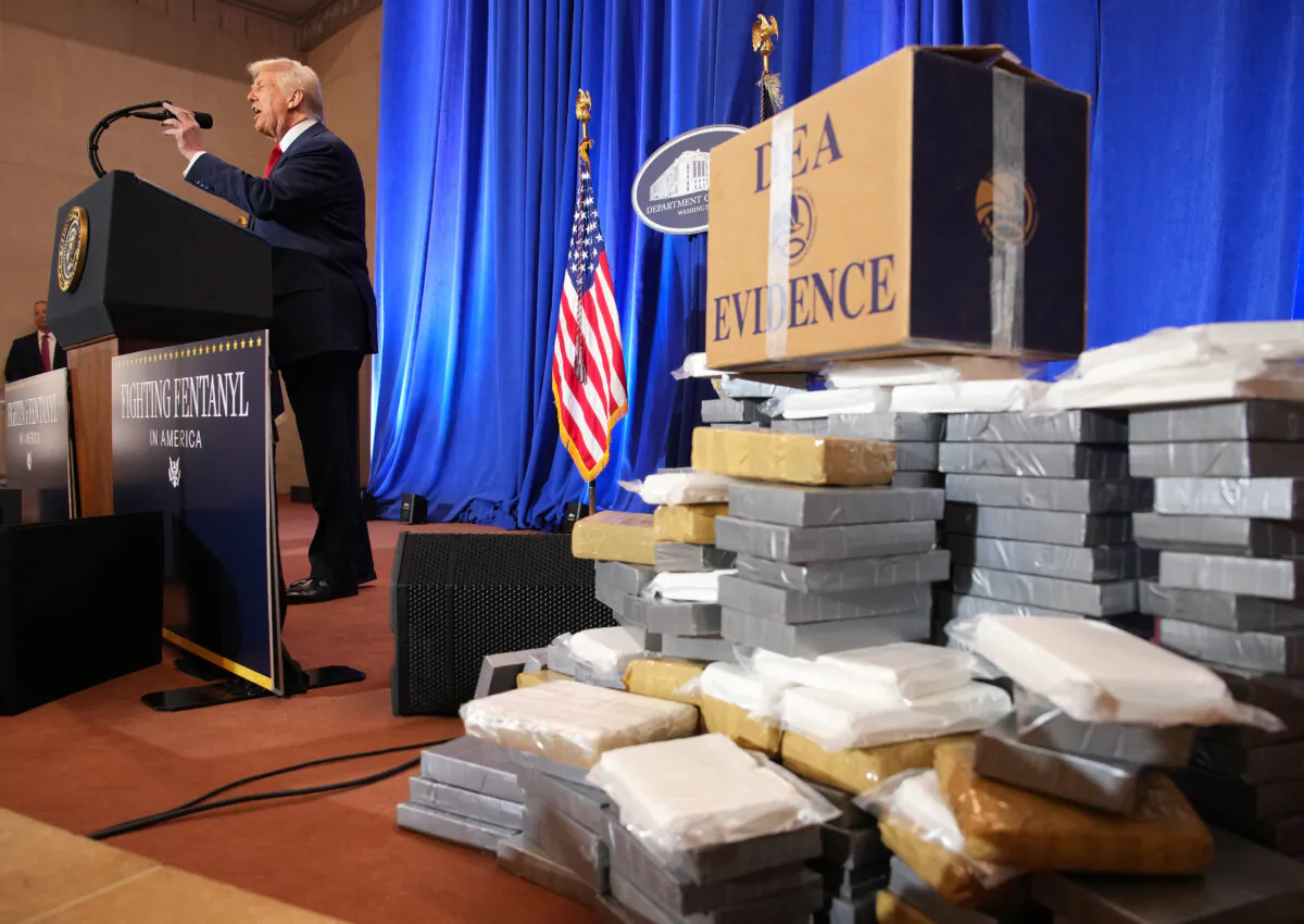 President Donald Trump speaks next to a display of "DEA Evidence" at the Justice Department in Washington, D.C., March 14, 2025. (Andrew Harnik/Getty Images)