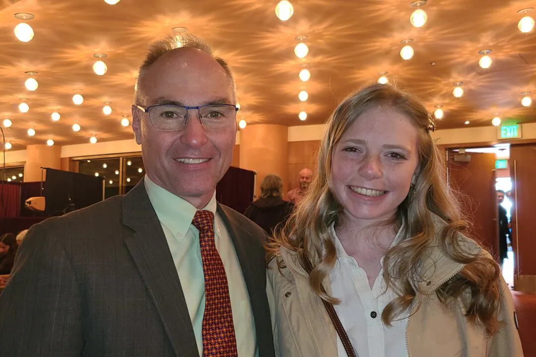Dan Gillespie and his daughter enjoyed Shen Yun at the George S. and Dolores Doré Eccles Theater in Salt Lake City on March 22, 2025. (Lily Yu/The Epoch Times)