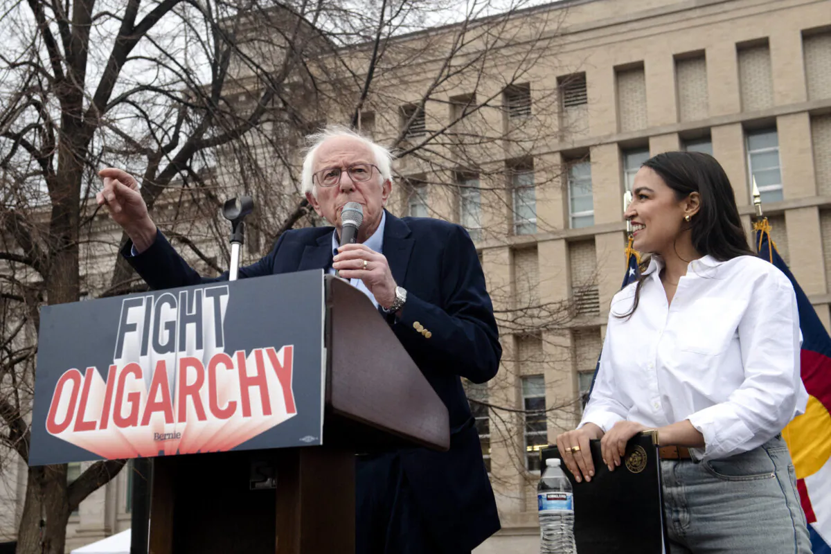 Sen. Bernie Sanders (I-Vt.) and Rep. Alexandria Ocasio Cortez (D-N.Y.) speak to supporters during the "Fighting Oligarchy: Where We Go From Here" rally at Civic Center Park in Denver on March 21, 2025. (Jason Connolly/AFP via Getty Images)