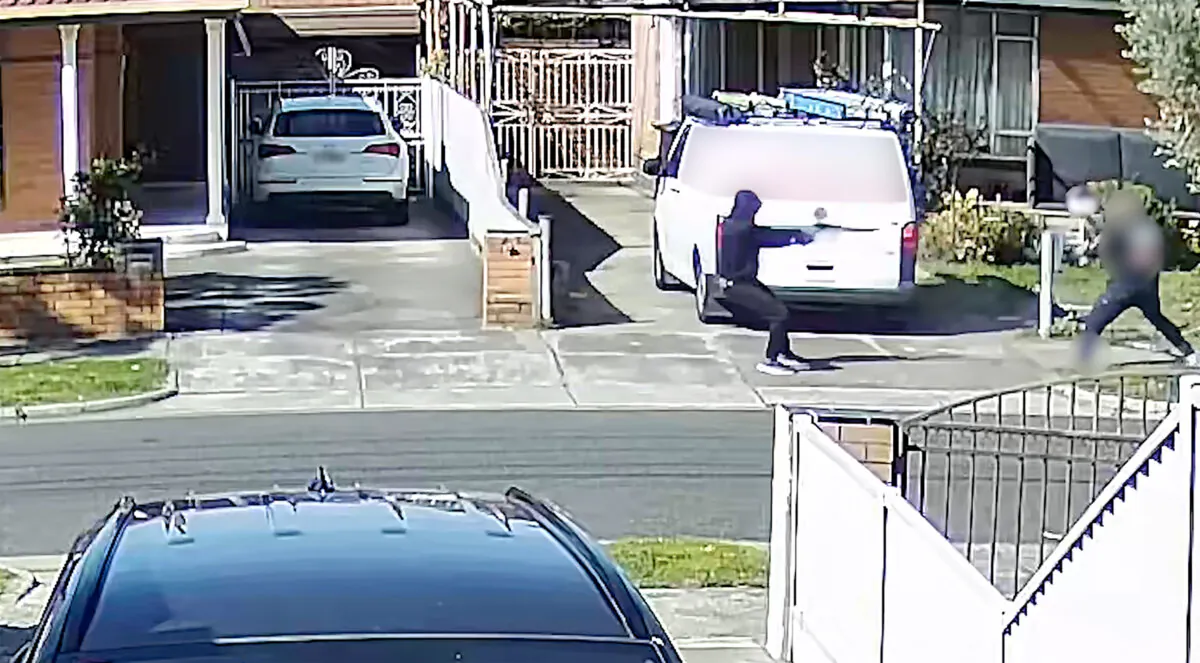 A screengrab from a supplied video obtained on March 24, 2025, shows an armed man shooting a man in the ankle outside a Fawkner home, in Melbourne's north, on Oct. 3, 2024. (AAP Image/Supplied by Victoria Police)