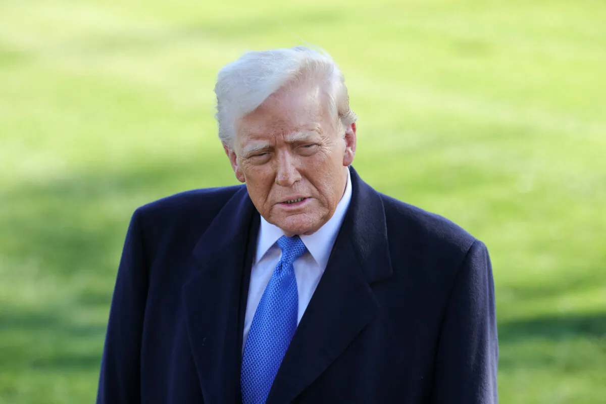 President Donald Trump speaks to reporters at the White House on March 21, 2025. (Bryan Dozier/Middle East Images/AFP via Getty Images)