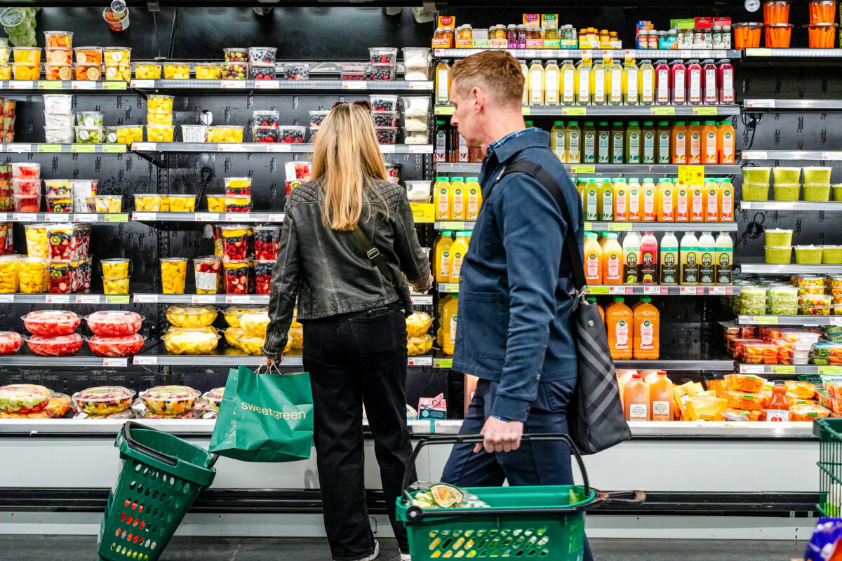 People shop at a grocery store in New York City on March 12, 2025. (Samira Bouaou/The Epoch Times)