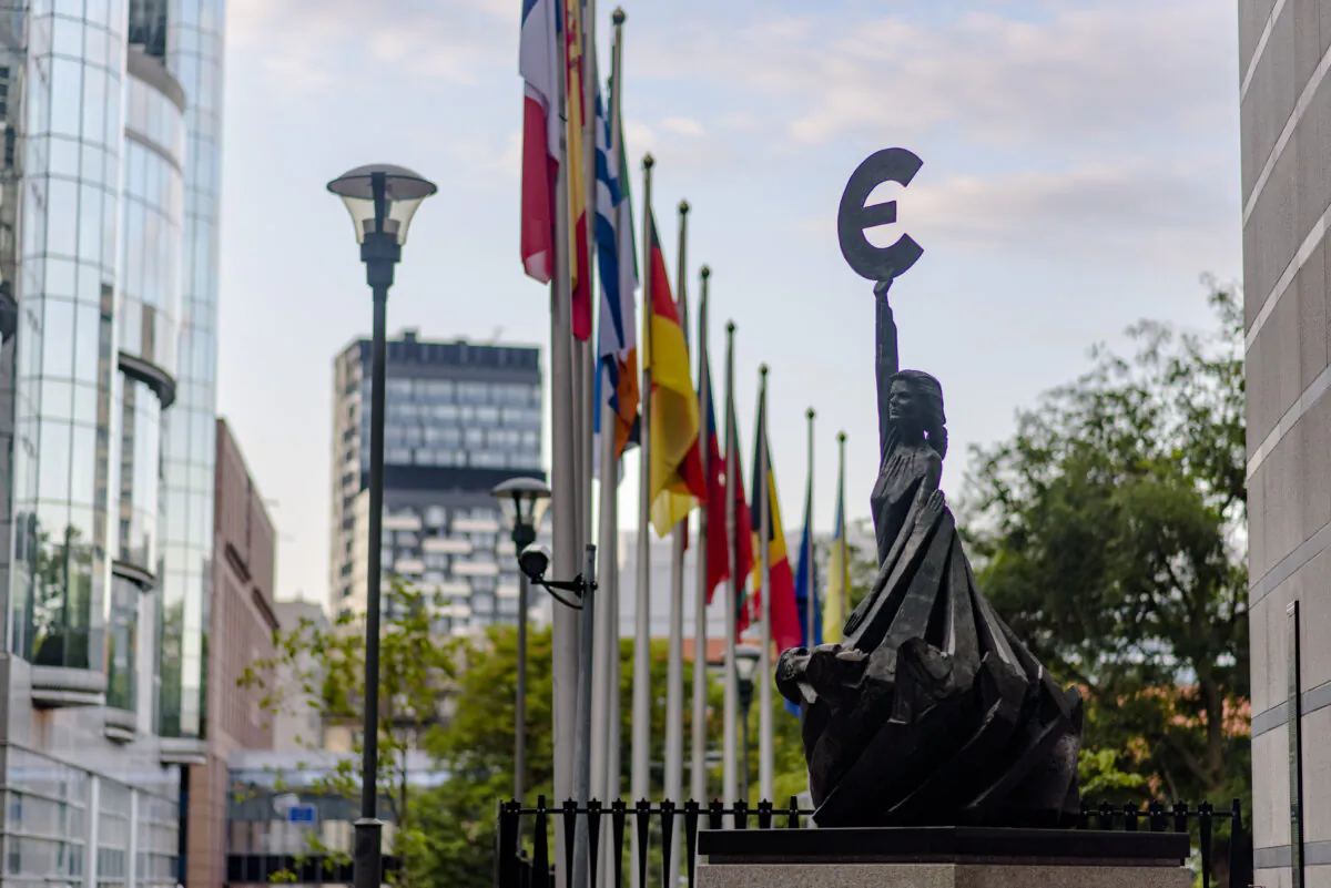 A statue of the Greek goddess Europa holding the Euro symbol at the European Parliament building in Brussels on July 21, 2023. (Lavinia Savu/The Epoch Times)