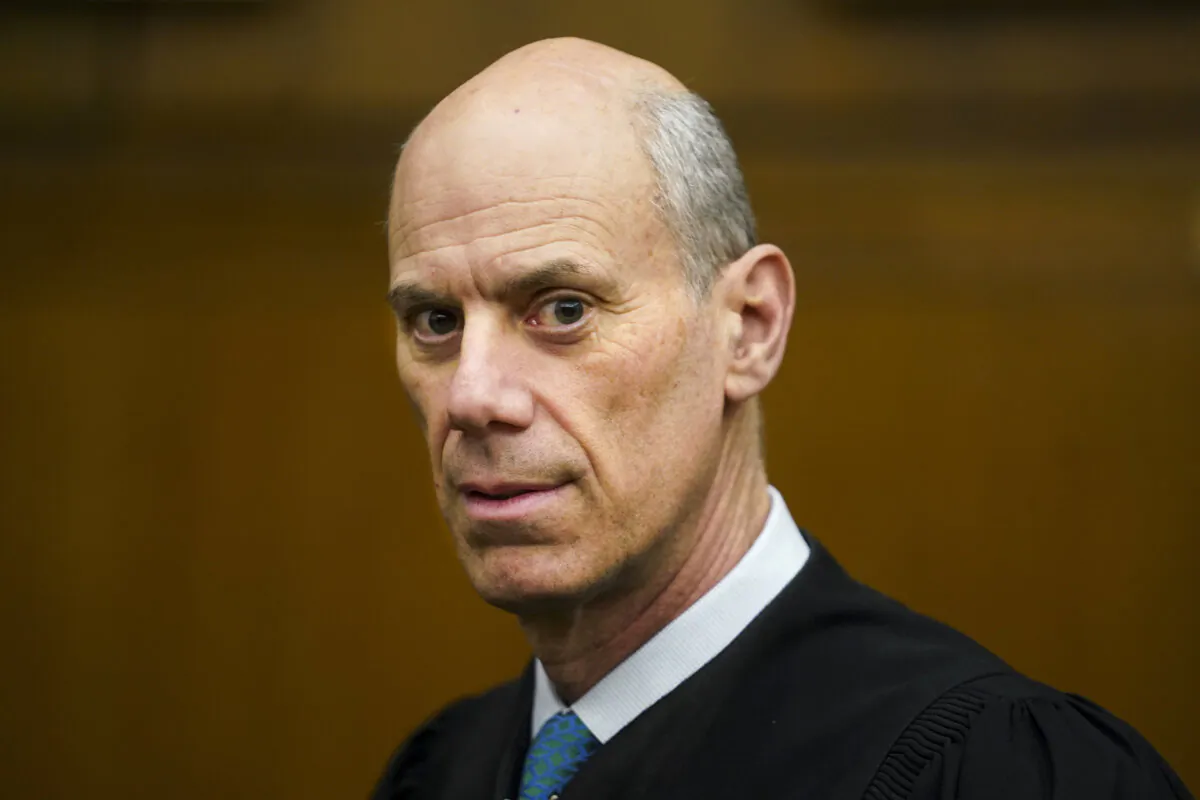 U.S. District Judge James Boasberg, chief judge of the United States District Court for the District of Columbia, stands for a portrait at E. Barrett Prettyman Federal Courthouse in Washington on March 16, 2023. (Carolyn Van Houten/The Washington Post via AP)