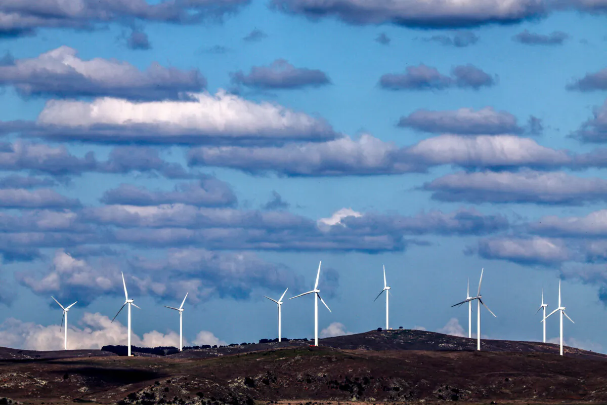 Clouds can be seen above power-generating wind turbines at the Capital Wind Farm, located at Lake George, near the town of Bungendore, Australia, on March 25, 2025. (David Gray/AFP via Getty Images)