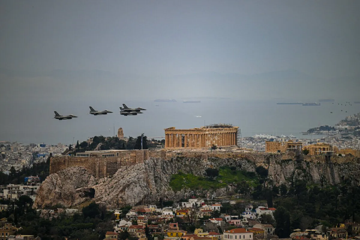 Hellenic Air Force F-16 jets fly over the Parthenon and the Acropolis during the military parade marking Greece's Independence Day in Athens, on March 25, 2025. (Theophile Bloudanis/AFP via Getty Images)
