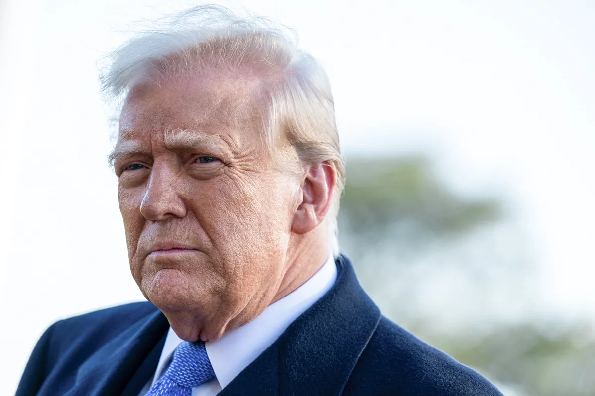 President Donald Trump speaks to the press as he departs the White House from the South Lawn on March 21, 2025. (Annabelle Gordon/AFP via Getty Images)