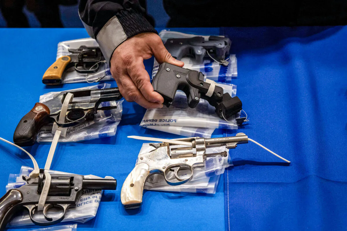 A person holds a 3D-printed ghost gun during a statewide gun buyback event held by the office of the New York State Attorney General in New York City on April 29, 2023. (Yuki Iwamura/AFP via Getty Images)