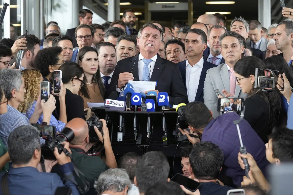 Former Brazilian President Jair Bolsonaro speaks to the press at Congress in Brasilia, Brazil, on March 26, 2025. (Eraldo Peres/AP Photo)