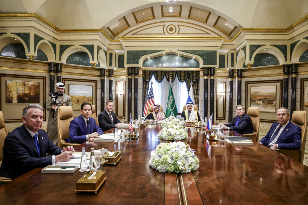 (L–R) U.S. Middle East envoy Steve Witkoff, U.S. Secretary of State Marco Rubio, U.S. national security adviser Mike Waltz, Saudi Arabian Foreign Minister Prince Faisal bin Farhan al-Saud, Saudi Arabian national security adviser Mosaad bin Mohammad al-Aiban, Russian foreign policy adviser Yuri Ushakov, and Russian Foreign Minister Sergei Lavrov attend a meeting at Riyadh Diriyah Palace in Diriyah, Saudi Arabia, on Feb. 18, 2025. (Evelyn Hockstein/Pool/AFP via Getty Images)