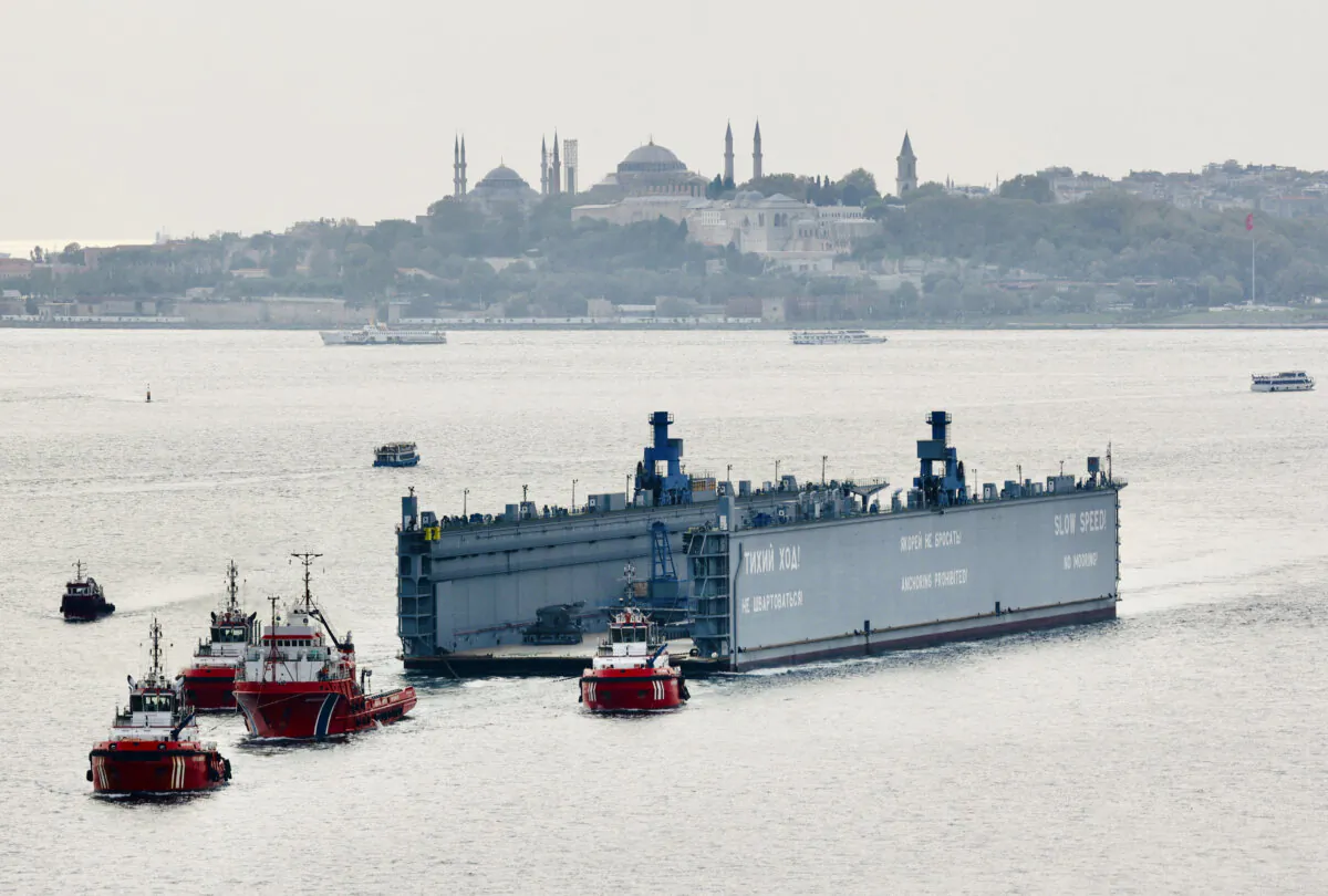 A Russian floating dock is towed by tugboats through Bosphorus to the Black Sea, in Istanbul, Turkey, on Sept. 18, 2024. (Yoruk Isik/Reuters)