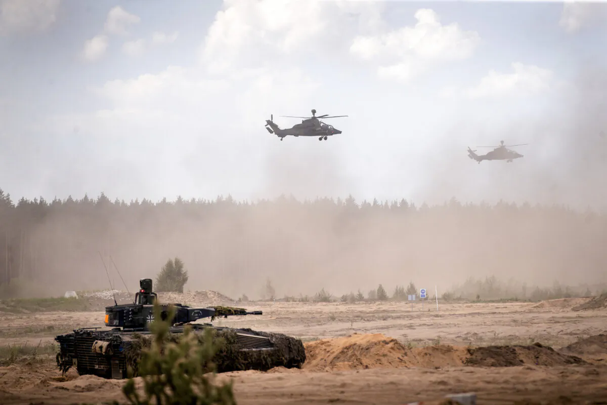 Eurocopter Tigers of the German Army take part in the Lithuanian-German division-level international military exercise 'Grand Quadriga 2024' at a training range in Pabrade, north of the capital Vilnius, Lithuania, on May 29, 2024. (AP Photo/Mindaugas Kulbis, File)