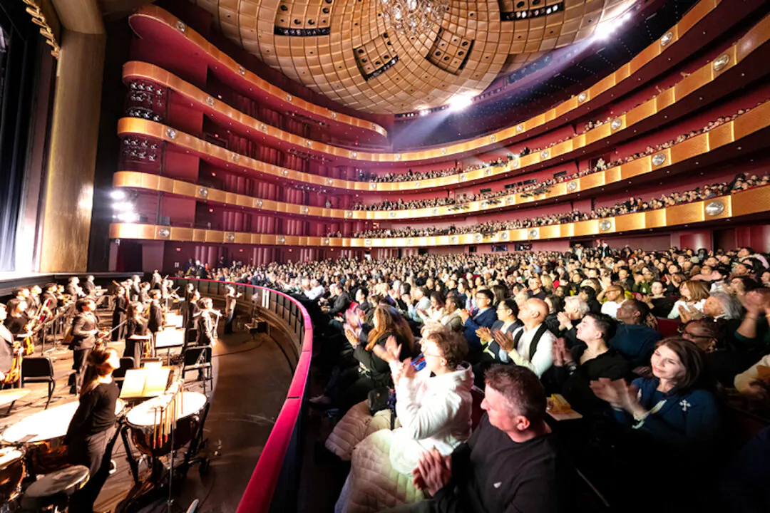 The audience applauds during the curtain call of a Shen Yun performance at the David H. Koch Theater at Lincoln Center in New York City on March 26, 2025. (Larry Dye/The Epoch Times)