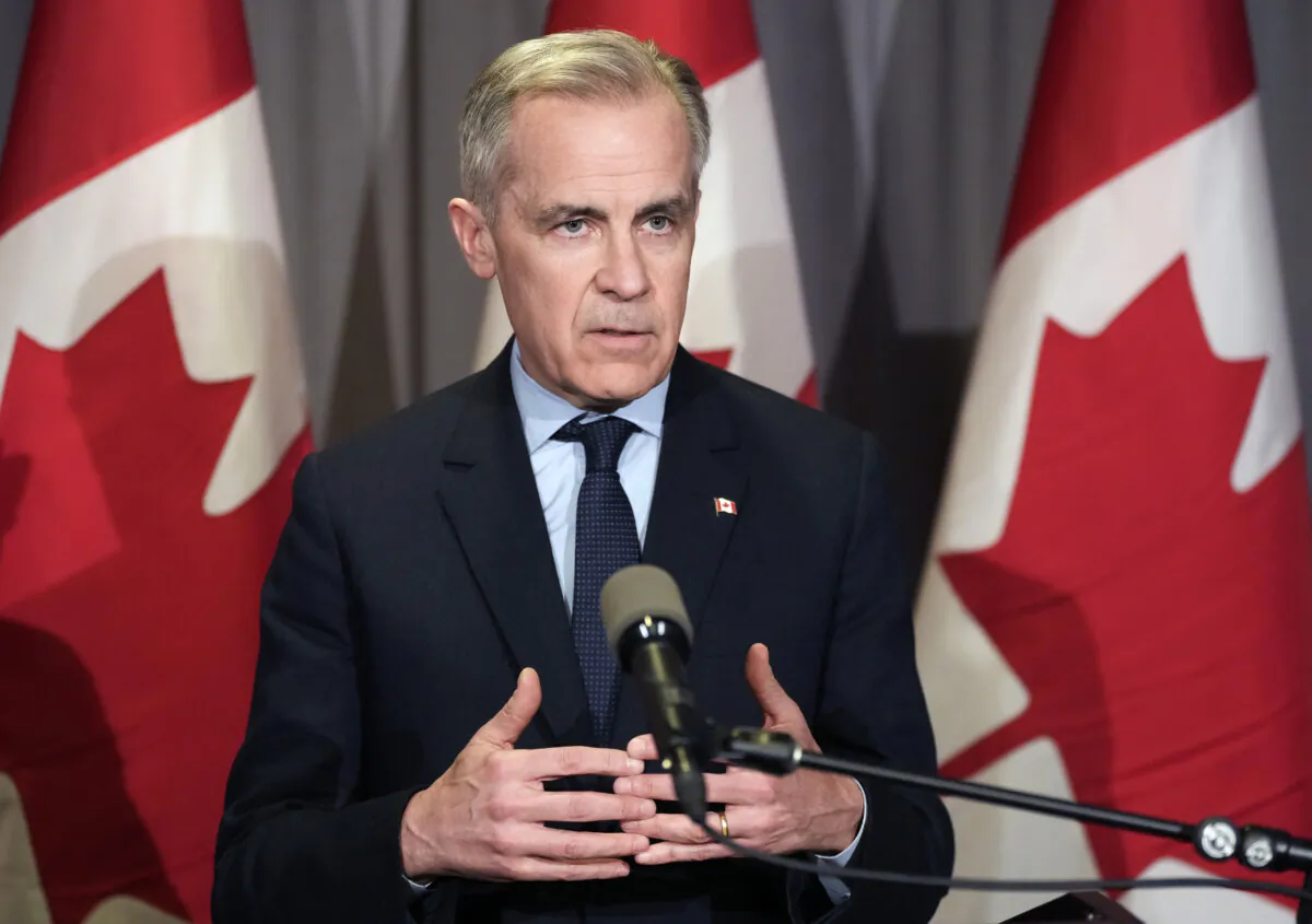 Liberal Leader Mark Carney speaks about new tariffs imposed by U.S. President Donald Trump during a press conference in Kitchener, Ont., on March 26, 2025. (The Canadian Press/Frank Gunn)