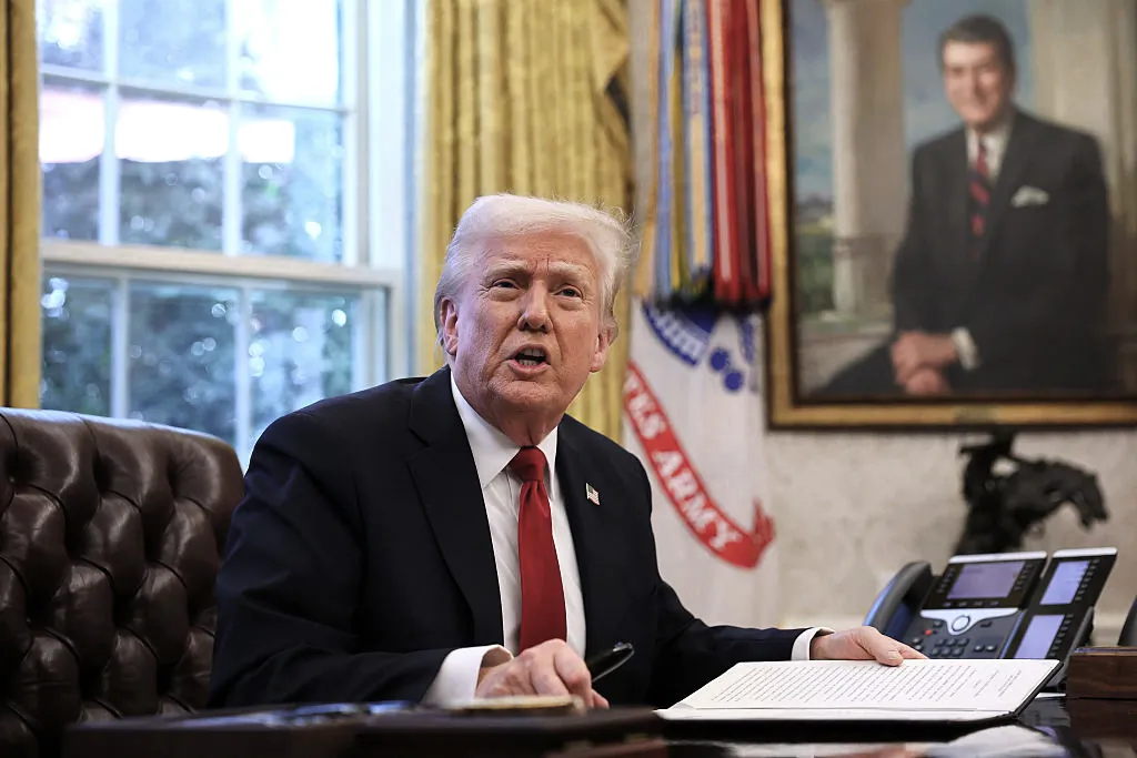 President Donald Trump speaks to the press before signing an executive order in the Oval Office on March 26, 2025. (Win McNamee/Getty Images)