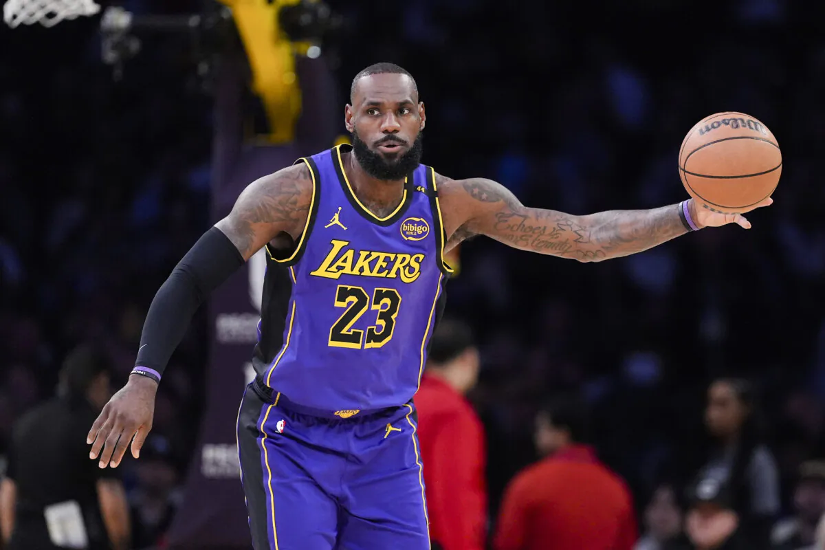 Lakers forward LeBron James receives a pass  against the Atlanta Hawks in Los Angeles  on Jan. 3, 2025. (Mark J. Terrill/AP Photo)