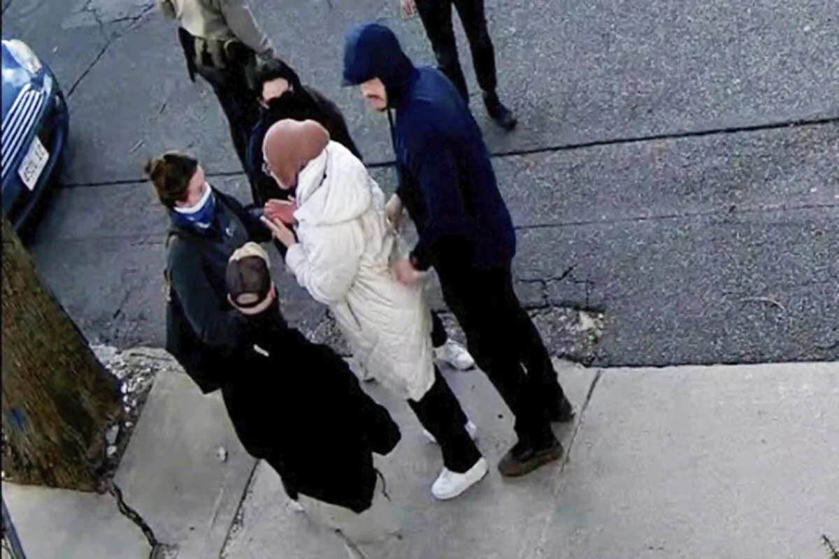 Rumeysa Ozturk, a 30-year-old doctoral student at Tufts University, is detained by Department of Homeland Security agents on a street in Sommerville, Mass., on March 26, 2025. (AP Photo)