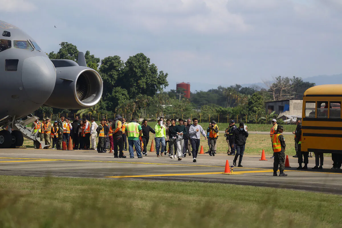 Illegal immigrants deported by the U.S. government arrive by plane in San Pedro Sula, Honduras, on Jan. 31, 2025. (Jorge Salvador Cabrera/Getty Images)