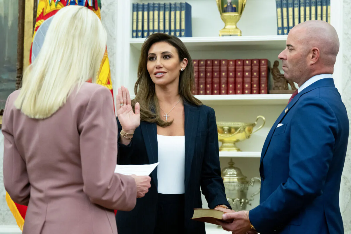 Alina Habba, next to husband Gregg Reuben, is sworn in by U.S. Attorney General Pam Bondi as interim U.S. Attorney for the District of New Jersey, in the Oval Office on March 28, 2025. (Saul Loeb/AFP via Getty Images)