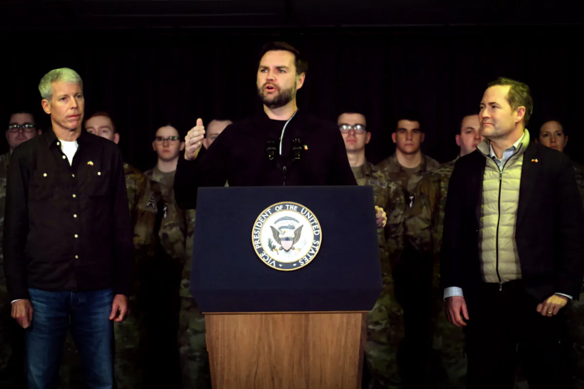Vice President JD Vance (C), with Secretary of Energy Chris Wright (L) and national security advisor Mike Waltz (R), speaks at the U.S. military's Pituffik Space Base in Pituffik, Greenland, on March 28, 2025. (Jim Watson/Pool via Getty Images)