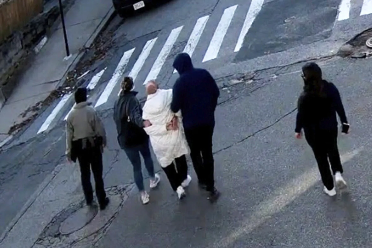 In this image taken from security camera video, Rumeysa Ozturk, a 30-year-old doctoral student at Tufts University, is detained by Department of Homeland Security agents on a street in Sommerville, Mass., on March 26, 2025. (AP Photo)