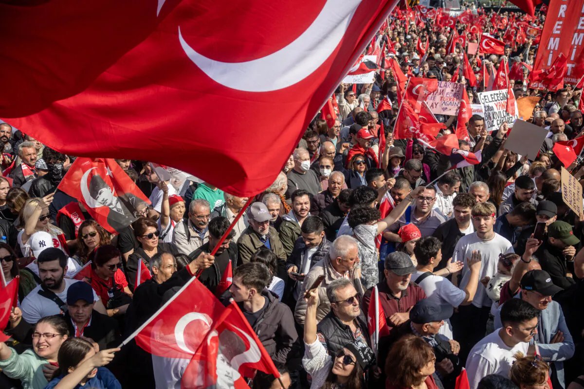 People wave flags and chant slogans during a mass protest rally in support of arrested Istanbul Mayor Ekrem Imamoglu, in Istanbul, Turkey, on March 29, 2025. (Chris McGrath/Getty Images)