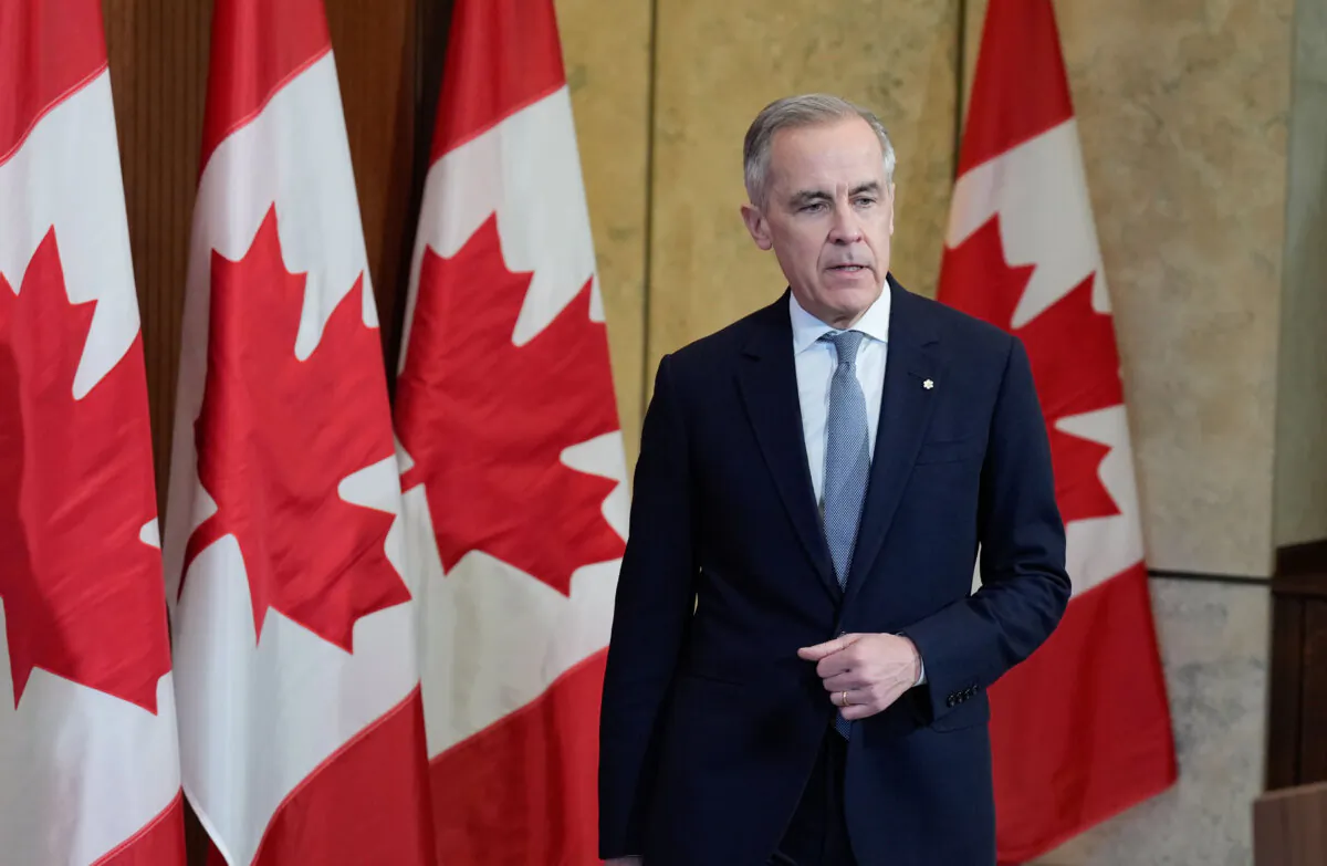Liberal Leader Mark Carney speaks with media on Parliament Hill  in Ottawa on March 27, 2025. (The Canadian Press/Adrian Wyld)