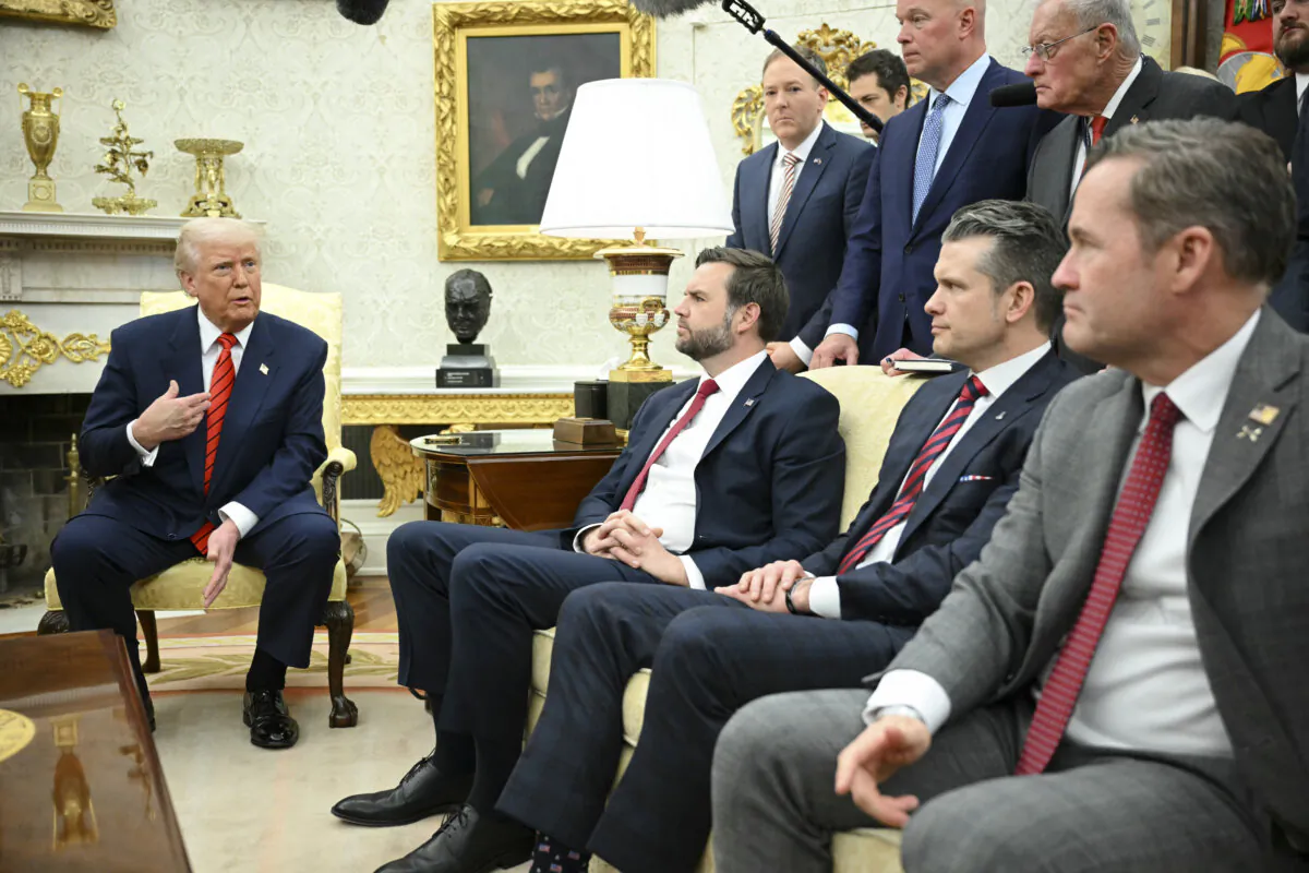 President Donald Trump speaks to the press as he meets with NATO Secretary General Mark Rutte in the Oval Office of the White House on March 13, 2025. Seated from L to R, Vice President JD Vance, Defense Secretary Pete Hegseth and national security advisor Mike Waltz. (Mandel Ngan/AFP via Getty Images)