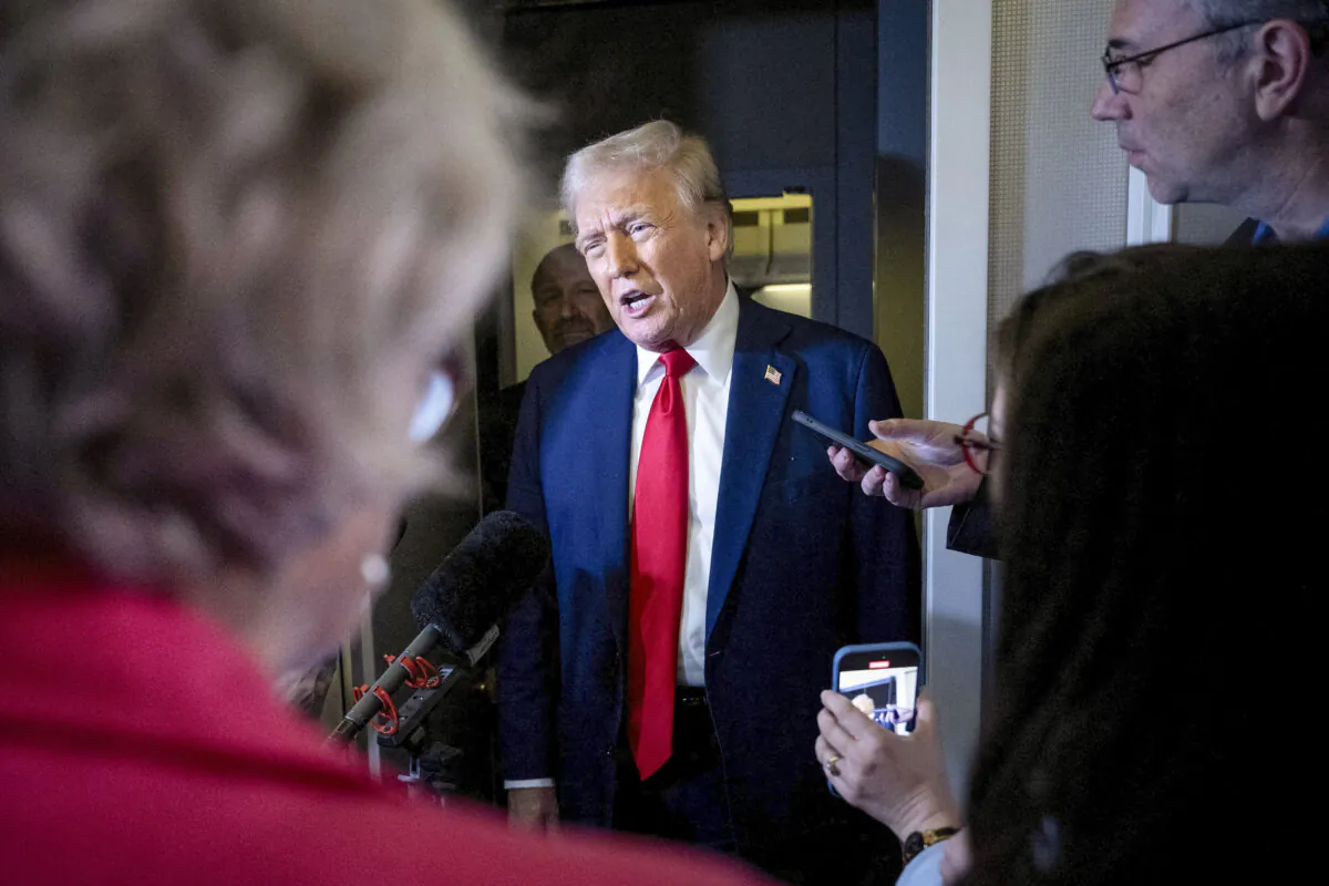 President Donald Trump speaks to reporters while returning to Washington on Air Force One from Fredericksburg, Va., on March 30, 2025. (Brendan Smialowski/AFP via Getty Images)