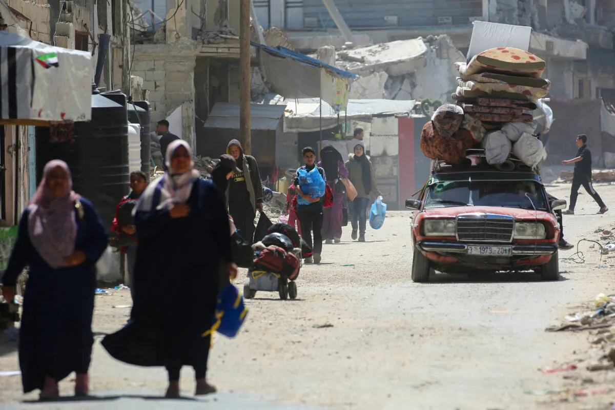 People fleeing Rafah arrive in Khan Yunis city following new Israeli evacuation orders, in the southern Gaza Strip, on March 31, 2025. (Eyad Baba/AFP via Getty Images)