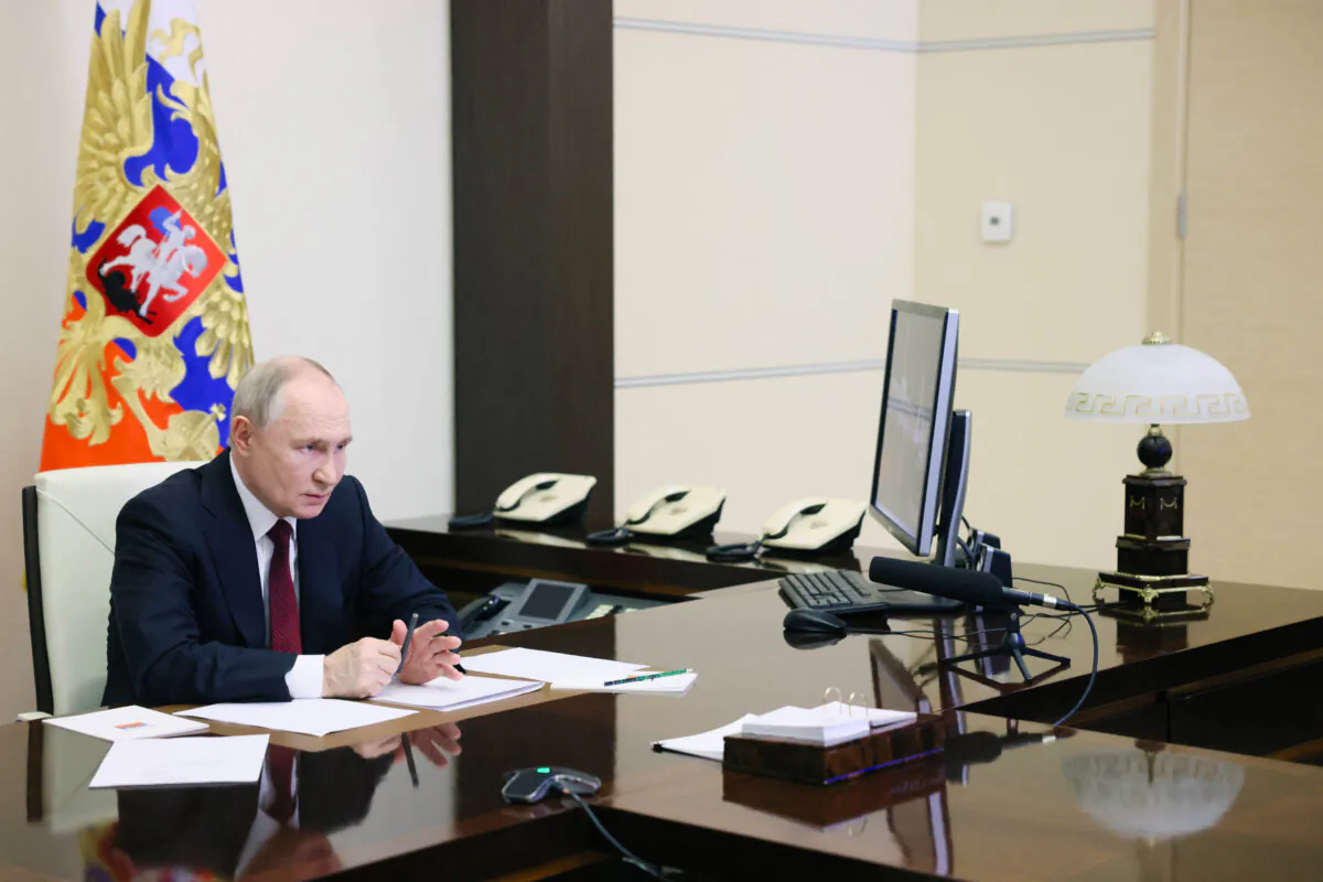 Russian President Vladimir Putin chairs a meeting on rare earth metals production via a video link from his residence outside Moscow on Feb. 24, 2025. (Sputnik/Alexei Babushkin/Pool via Reuters)