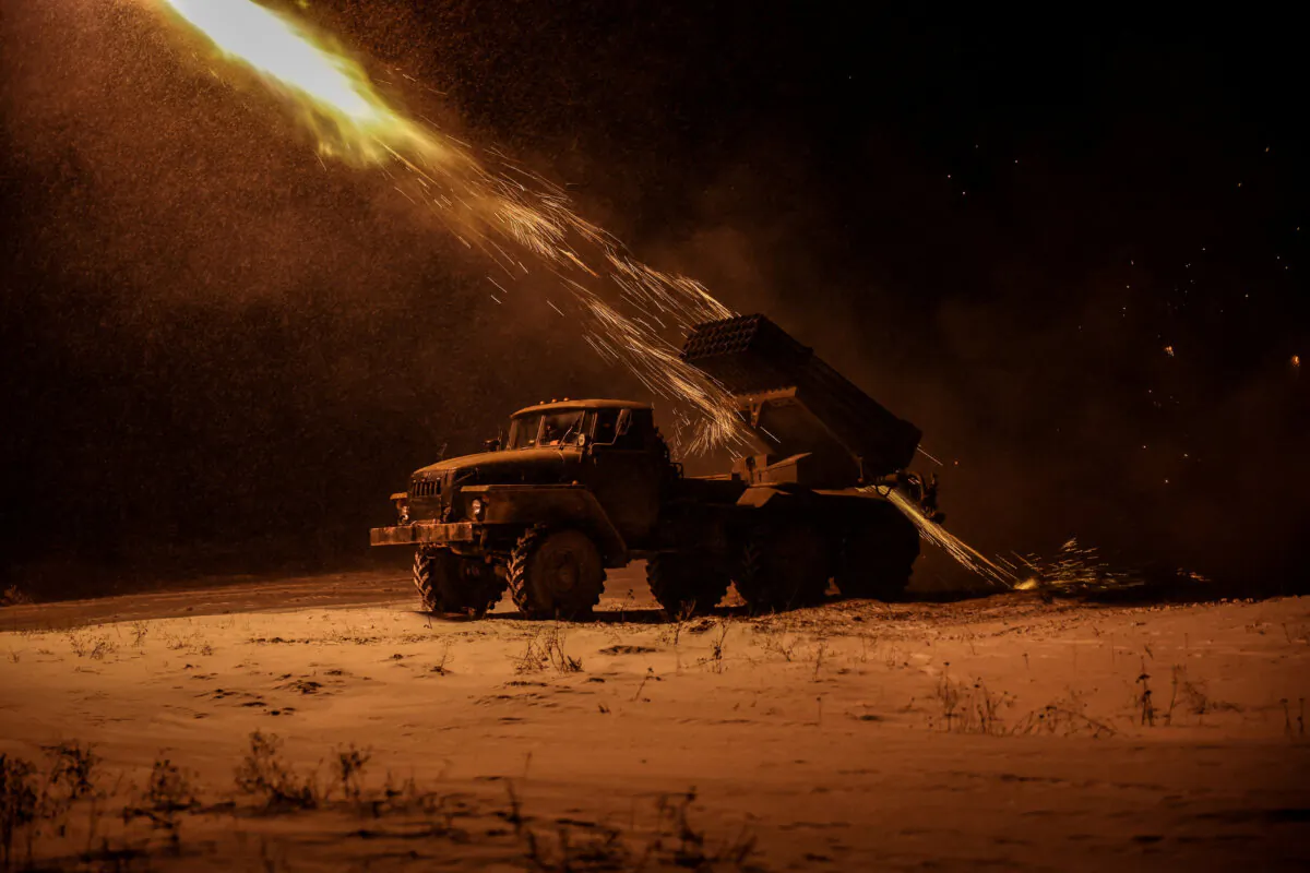 Ukrainian forces fire a BM-21 Grad multiple-launch rocket system toward Russian troops, on a front line in the Donetsk region of Ukraine on Feb. 23, 2025. (Handout via Reuters/File Photo)