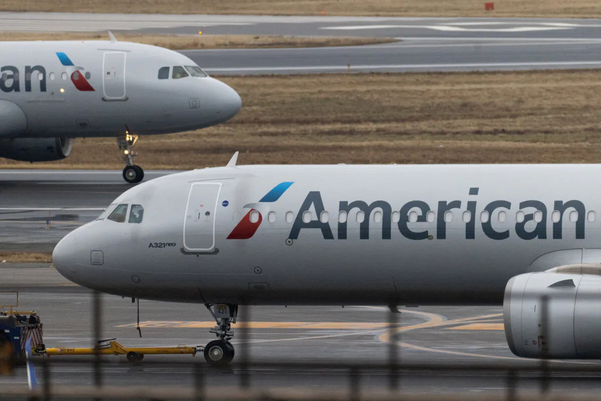 An American Airlines jet lands at Ronald Reagan Washington National Airport outside Washington on Jan. 31, 2025. (Jeenah Moon/Reuters)