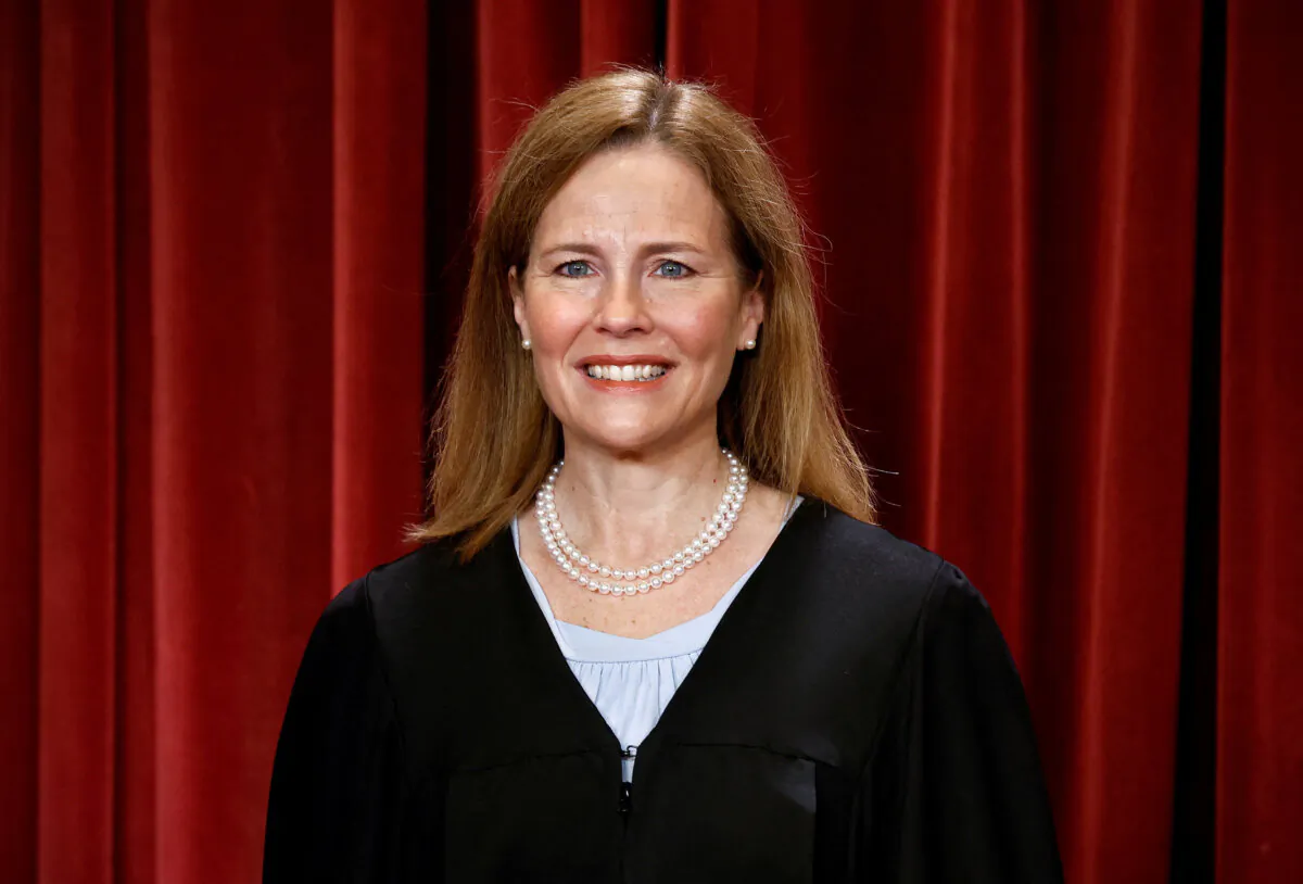 U.S. Supreme Court Associate Justice Amy Coney Barrett poses during a group portrait at the Supreme Court in Washington, on Oct. 7, 2022. (Evelyn Hockstein/Reuters)