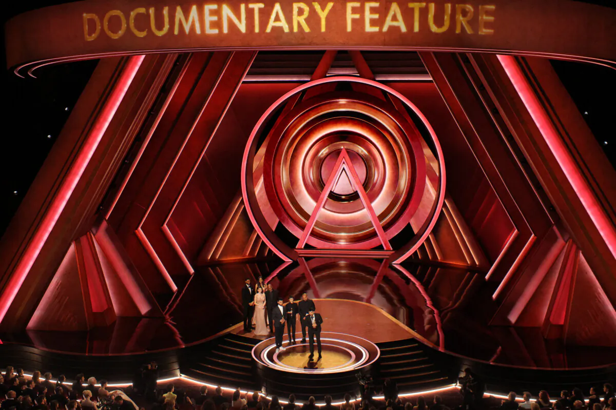 Basel Adra, Rachel Szor, Hamdan Ballal, and Yuval Abraham win the Oscar for Best Documentary Feature Film for "No Other Land" during the Oscars show at the 97th Academy Awards in Hollywood, Calif., on March 2, 2025. (Carlos Barria/Reuters)