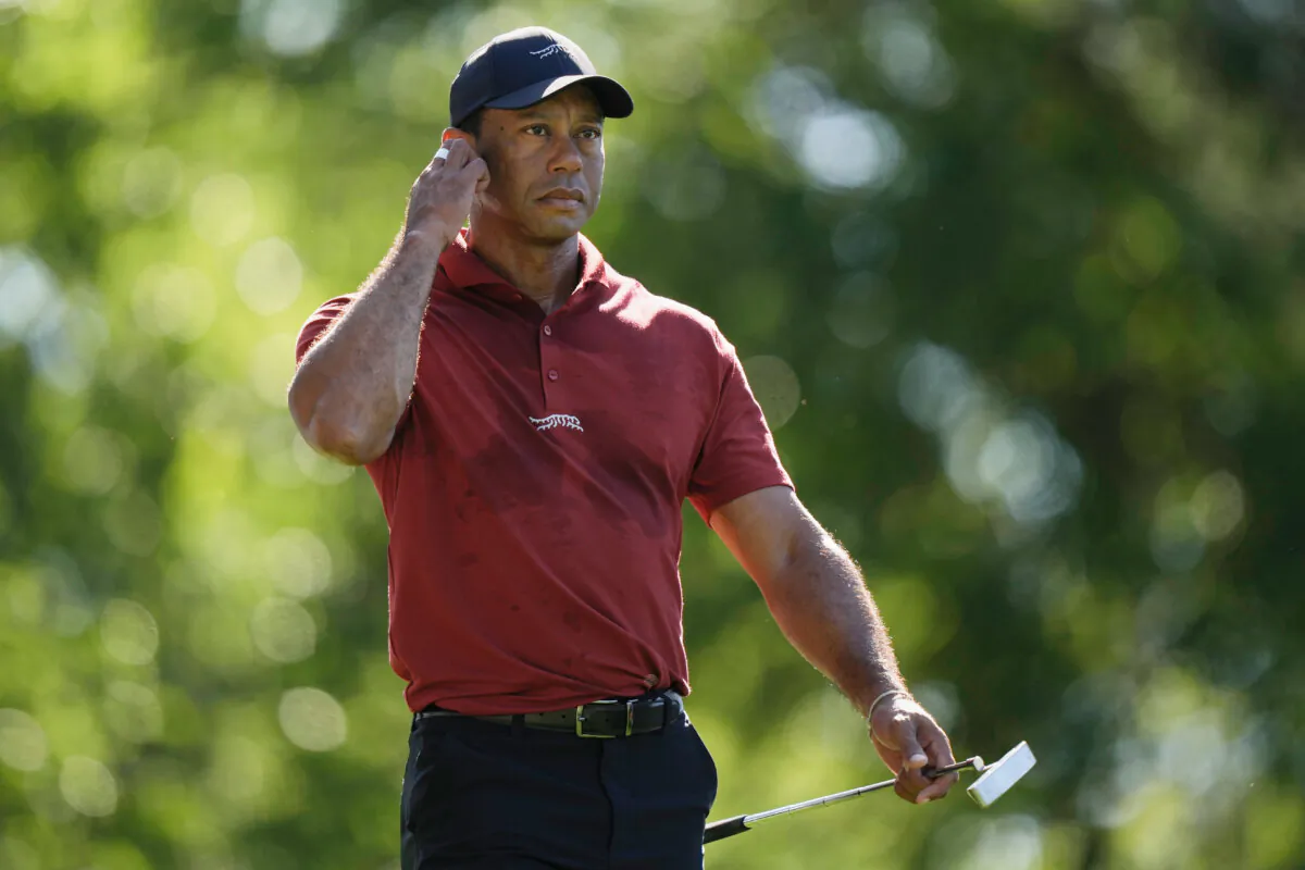 Tiger Woods walks to the green on the fifth hole during final round at the Masters golf tournament at Augusta National Golf Club in Augusta, Ga., on April 14, 2024. (Charlie Riedel/AP Photo)