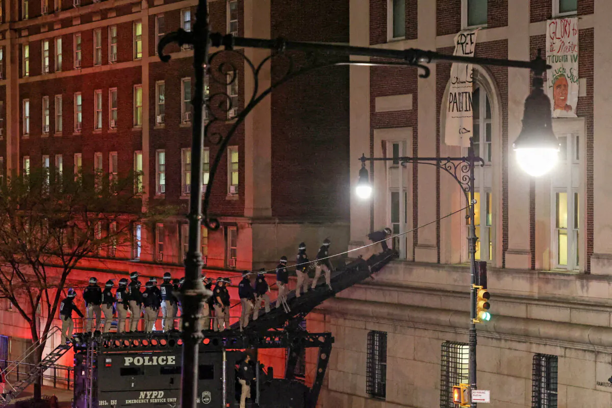 In this file photograph, police use a special vehicle to enter Hamilton Hall which was occupied by protesters at Columbia University in New York City on April 30, 2024. (Caitlin Ochs/Reuters)