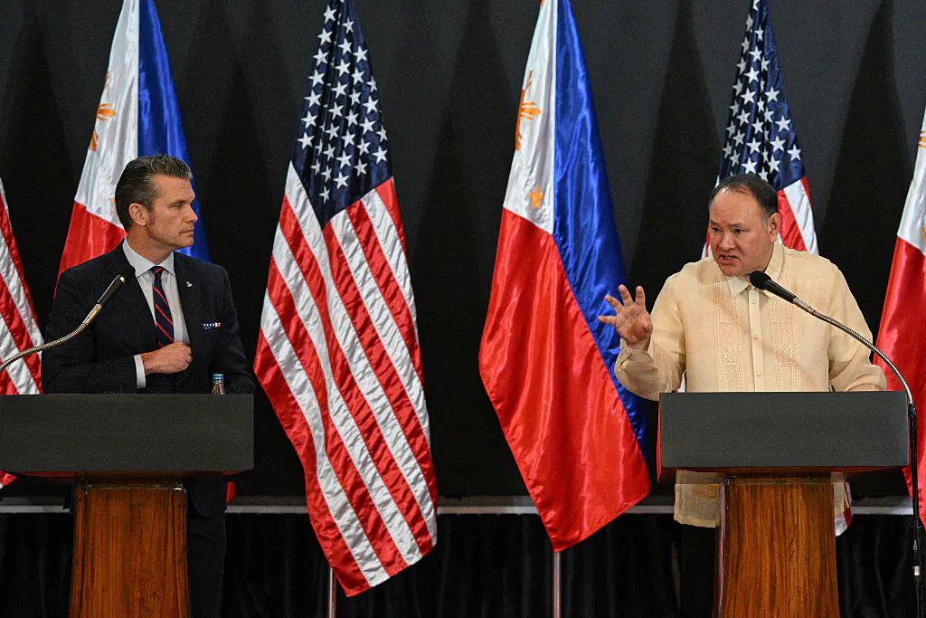 U.S. Secretary of Defense Pete Hegseth (L) and Philippines' Secretary of National Defense Gilberto Teodoro hold a joint press conference after their meeting at Camp Aguinaldo in Manila on March 28, 2025. (TED ALJIBE/AFP via Getty Images)
