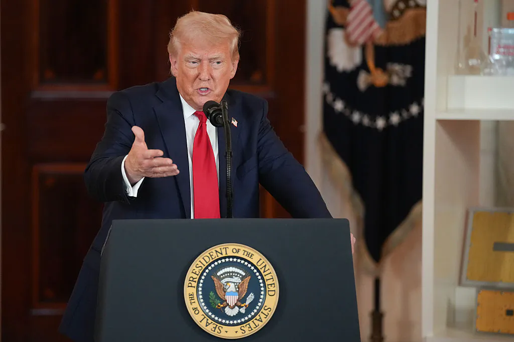 U.S. President Donald Trump speaks in the Cross Hall of the White House during an event on "Investing in America" in Washington on April 30, 2025. Trump was joined by CEOs to highlight their companies during the event. (Andrew Harnik/Getty Images)