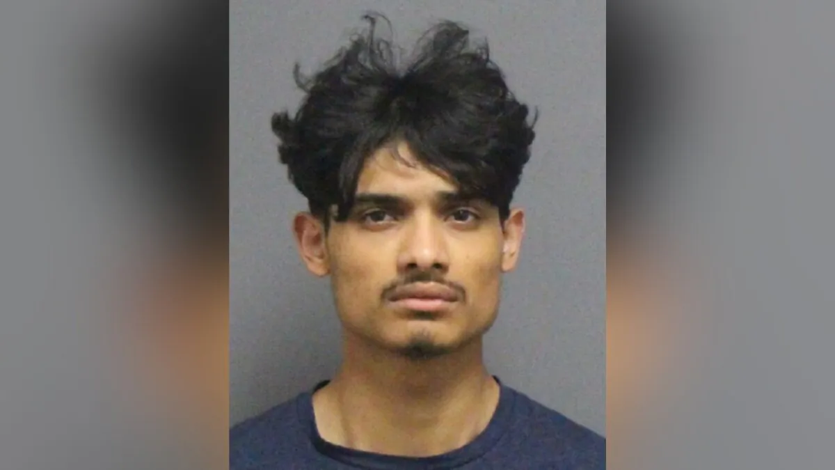 764 leader Prasan Nepal in a booking photo. (Courtesy of Guilford County Sheriff's Office)